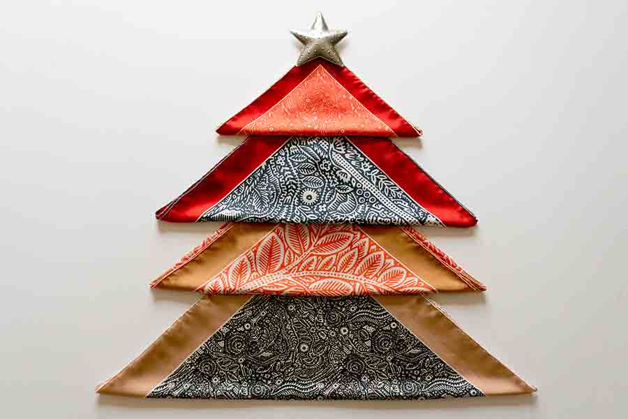silk scarf pleated in triangles to form a christmas tree