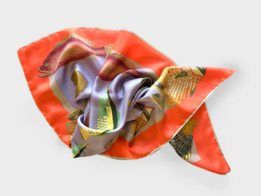 fish printed silk scarf arranged in fish shape