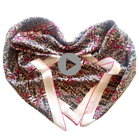 colorful printed silk scarf folded in heart shape