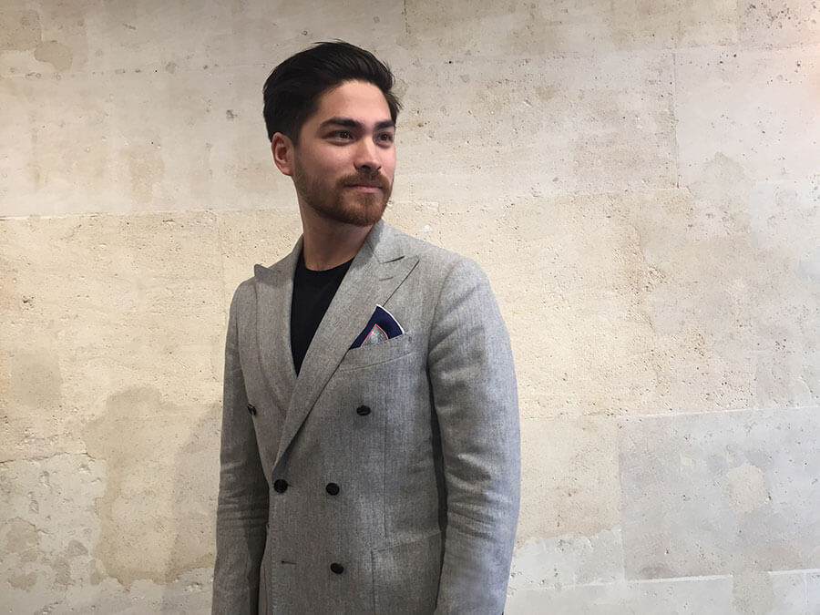 man in grey with grey pocket square