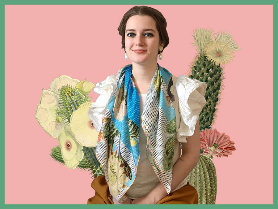 woman with cactus printed big blue and white silk scarf