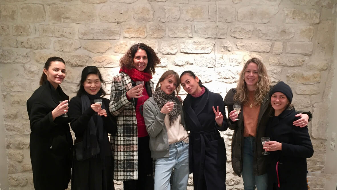 group of designers in an empty shop