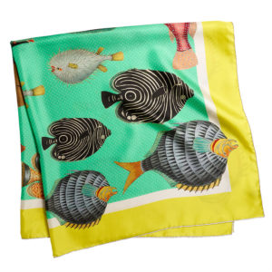 printed green silk twill scarf with colorful fishes folded