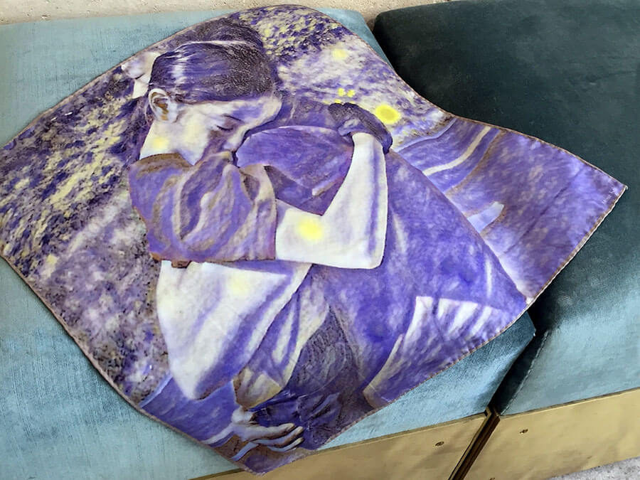 printed purple silk scarf with father and daughter on sofa