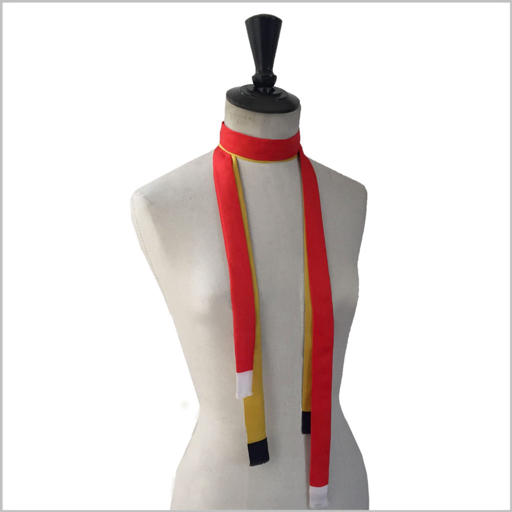 maannequin with pair of long skinny silk twill scarves