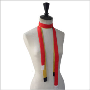 maannequin with pair of long skinny silk twill scarves
