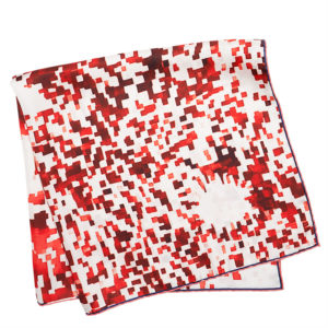 red printed silk scarf with mosaic flower folded