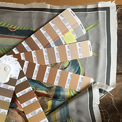 pantone color card on silk print trial with fish motif