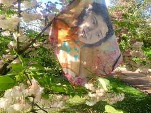 printed silk scarf of portrait painting on cherry blossoms