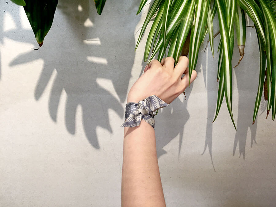 light blue and white leaf printed silk wristband on tied