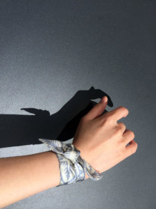 light blue and off-white leaf printed silk wristband