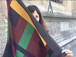 woman behind Perrodin Collaboration silk scarf in front of Beaux arts