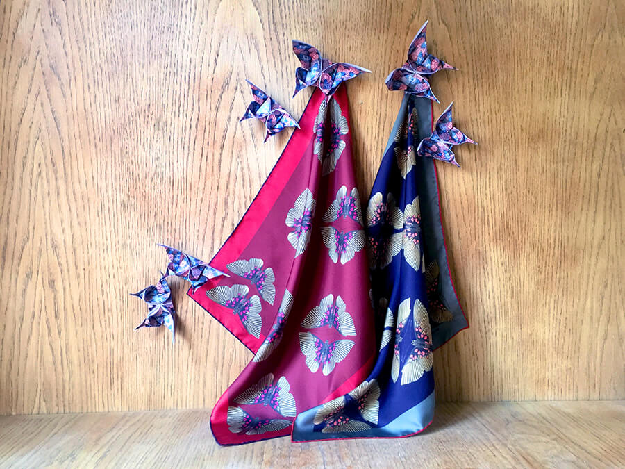 pair of butterfly printed silk scarves with origami butterflies