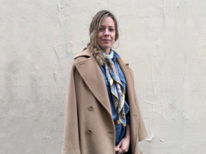 seashell printed blue silk scarf on a woman