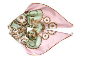 Seashell printed silk scarf folded like a fish