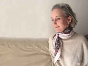 woman wearing Mother's Day custom made silk scarf from her son